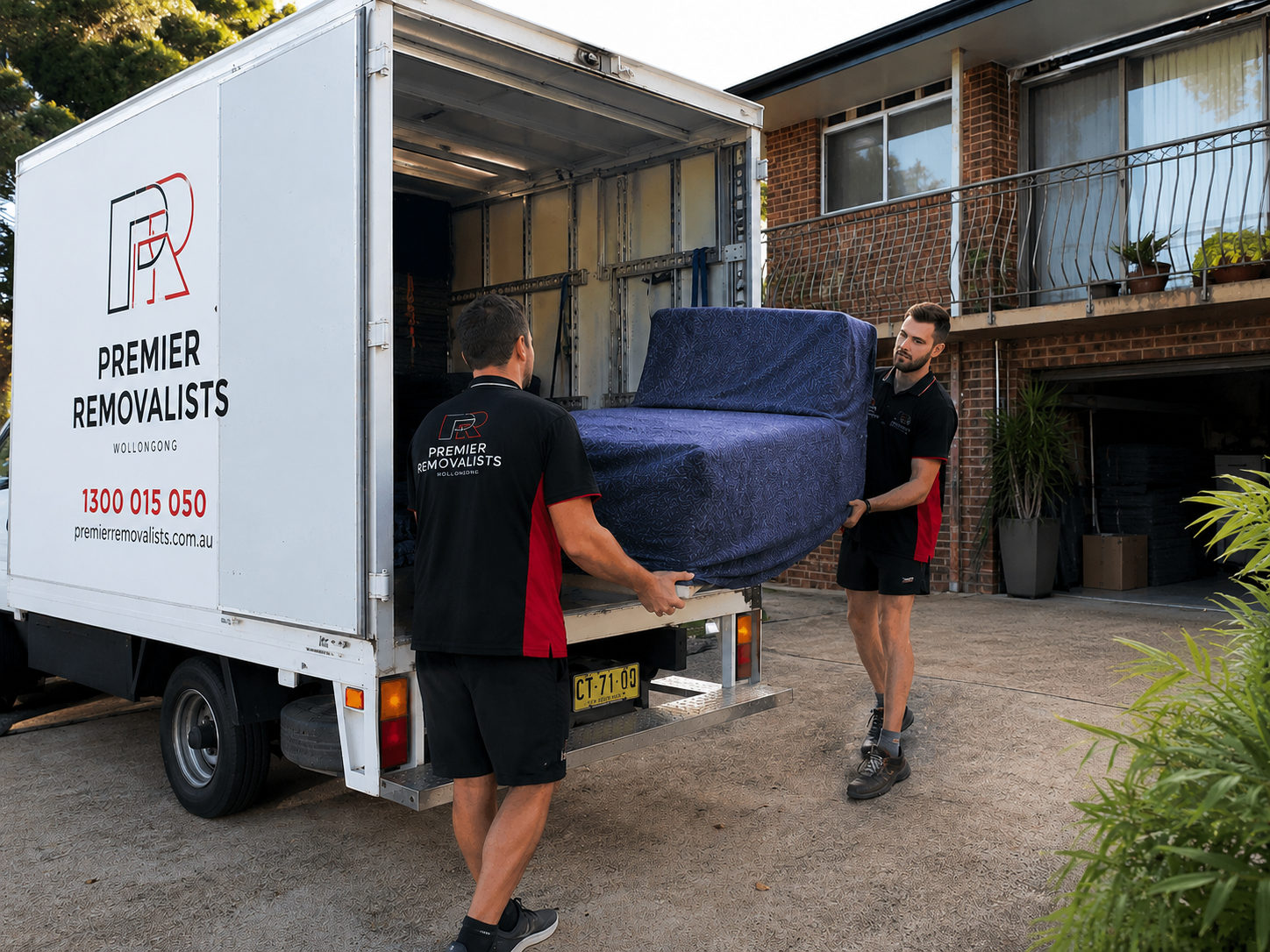 Premier Removalist team carrying furniture in Wollongong