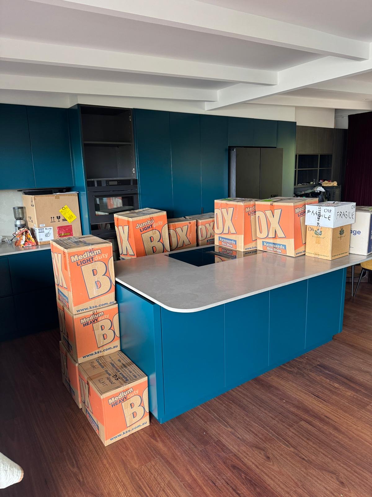 Removalist packing boxes for apartment move in Wollongong